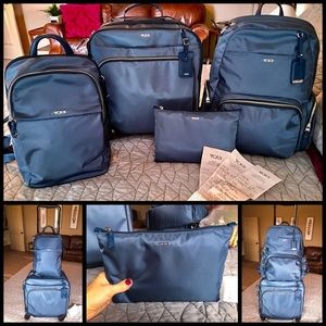 Beautiful Tumi Voyageur Luggage Set (4 piece set)
